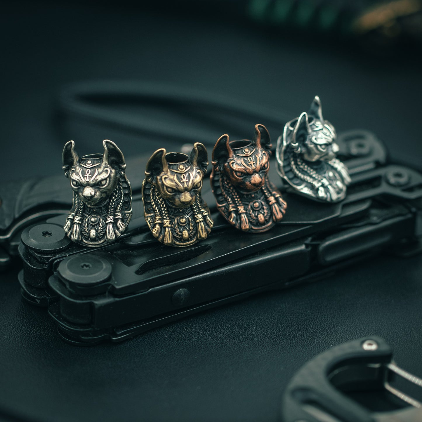 Top view of the handcrafted Bastet paracord bead, showcasing fine craftsmanship and bold design for collectors and outdoor enthusiasts.