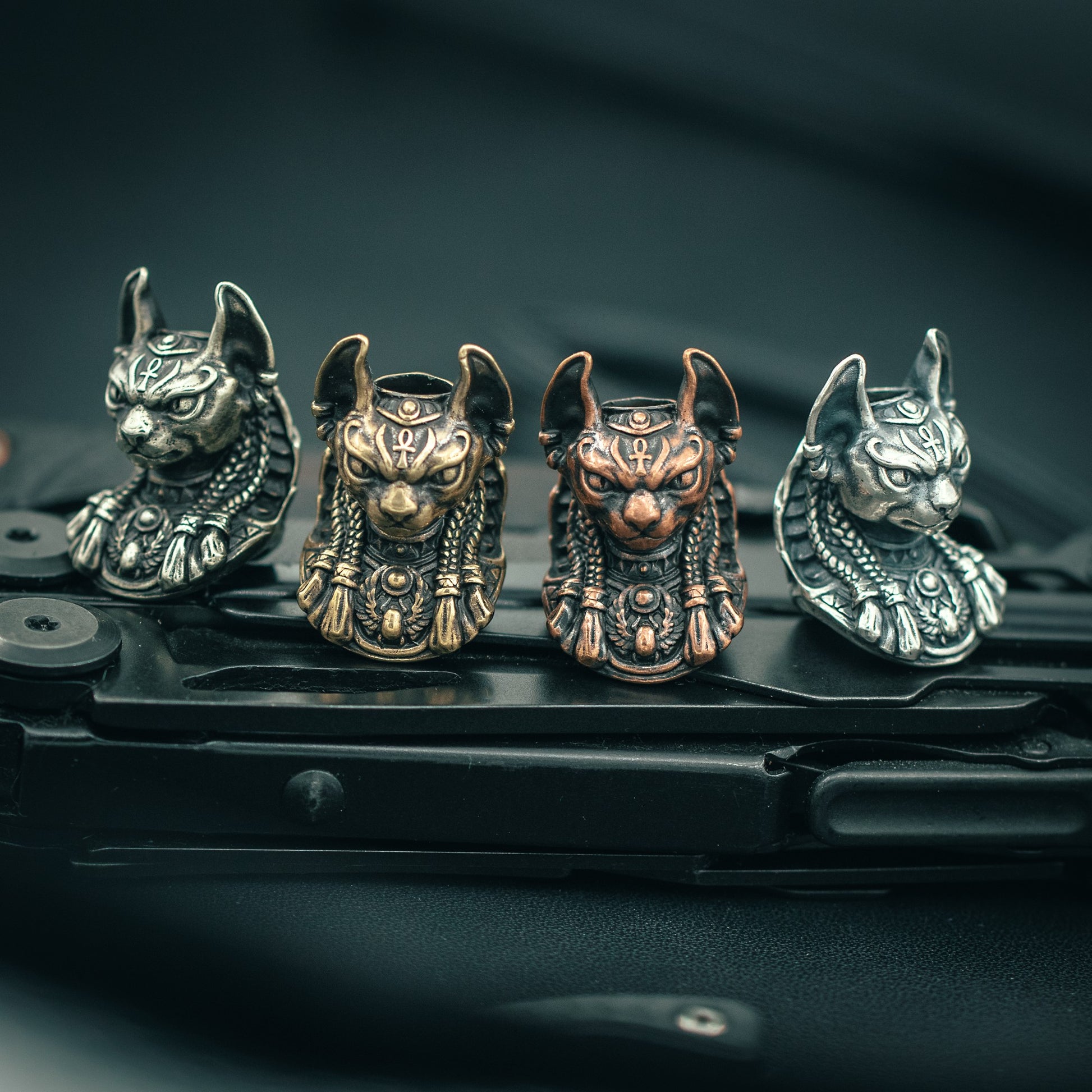 Handcrafted Bastet Egyptian Goddess paracord bead, symbolizing protection and power. Perfect for EDC gear, tactical lanyards, and survival accessories.