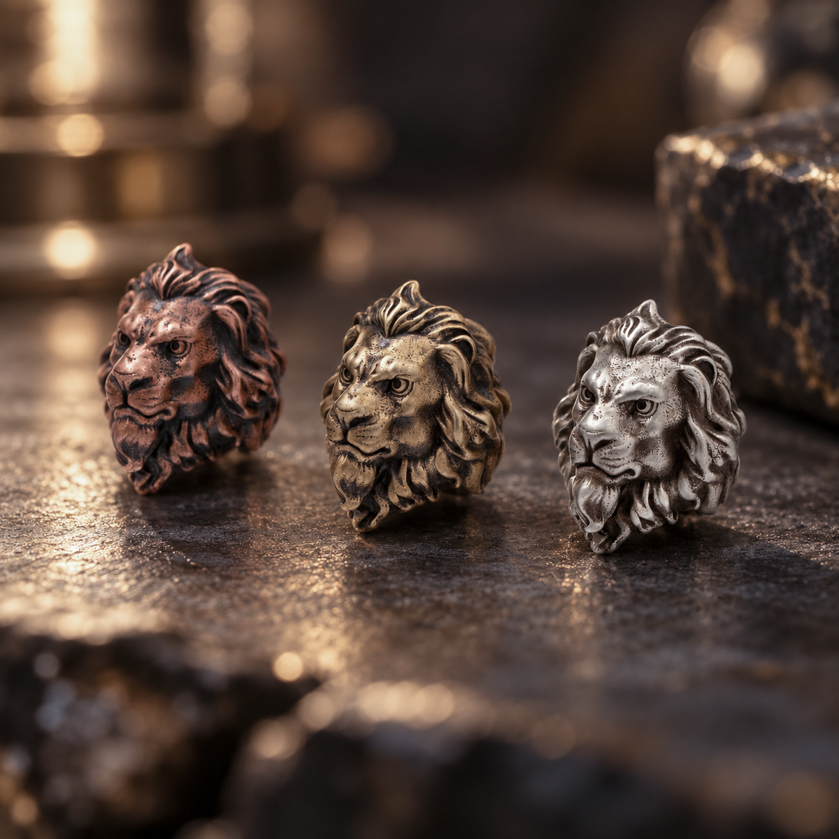 Brass, white brass and copper Sculpted Lion paracord beads showing detailed muzzles, layered manes and hand-aged metal finishes.