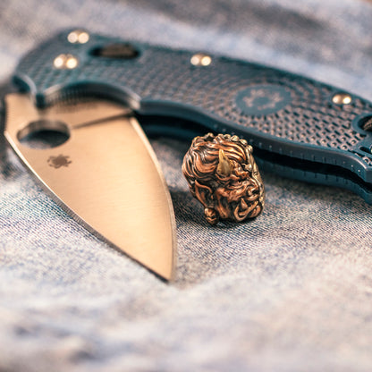 Paracord Bead three different metals edc with knife every day carry — copper, brass, and white brass — fused together into a single